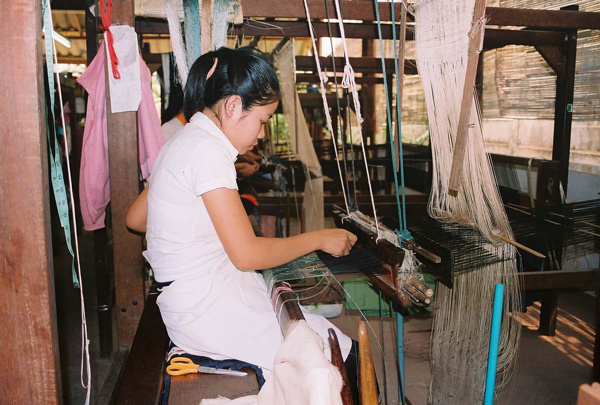 Lao Silk weaving with a hand loom, Vientiane
