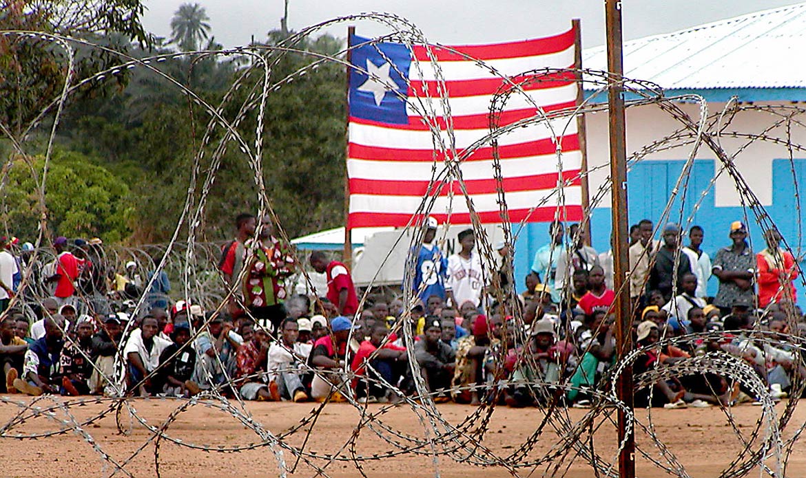 Ex-combatants waiting for their payment for disarming in Voinjama, Lofa County