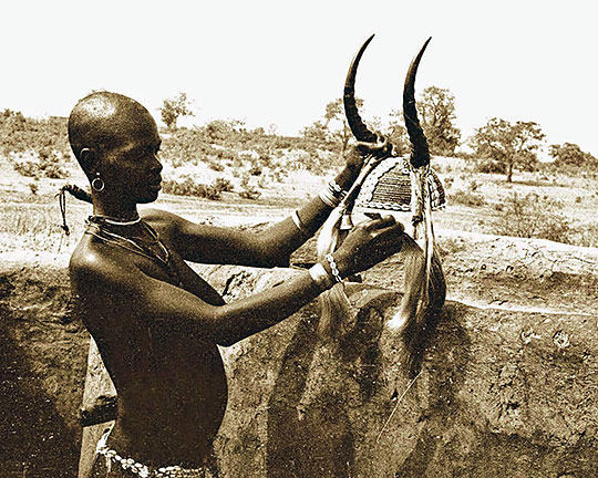 Togolese girl with headdress for the initiation ritual