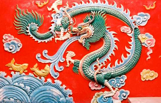 Dragon and Fishes in a Chinese temple Paxe Lao PDR