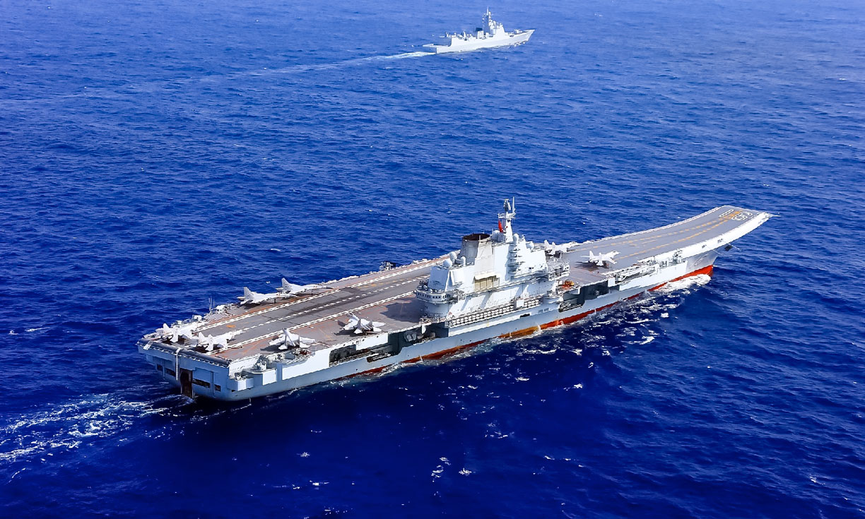 China's first aircraft carrier Liaoning (辽宁舰) in the waters of the South China Sea.