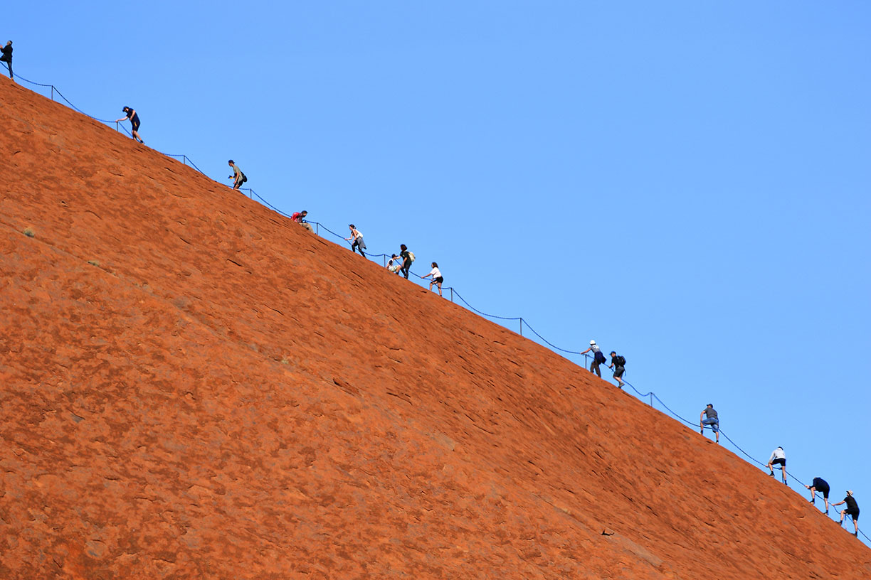 Tourists on Uluru, Uluru-Kata Tjuta National Park, Northern Territory of Australia
