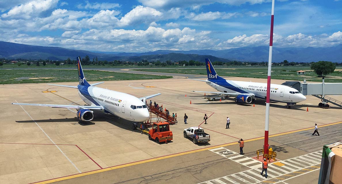 Two BoA Boeing 737-300s parked at Jorge Wilstermann International Airport.