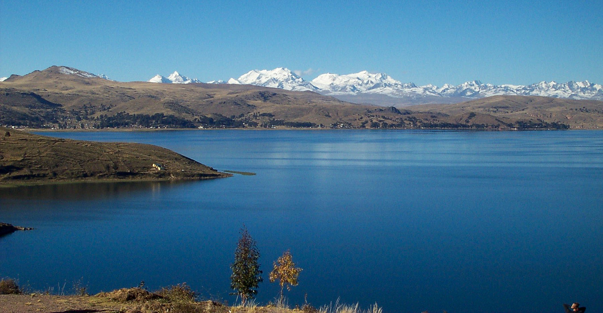 Lake Titicaca with the Andes mountain chain in the background; the Chearoco and Chachacomani mountains in the center.