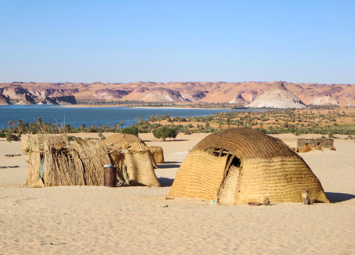 Lake Teli and huts of Ounianga Serir Village, a UNESCO World Heritage Site in Chad