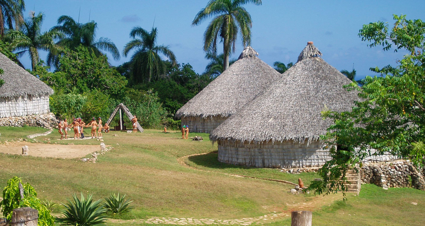 Reconstruction of a Taíno village in Chorro de Maíta, Cuba