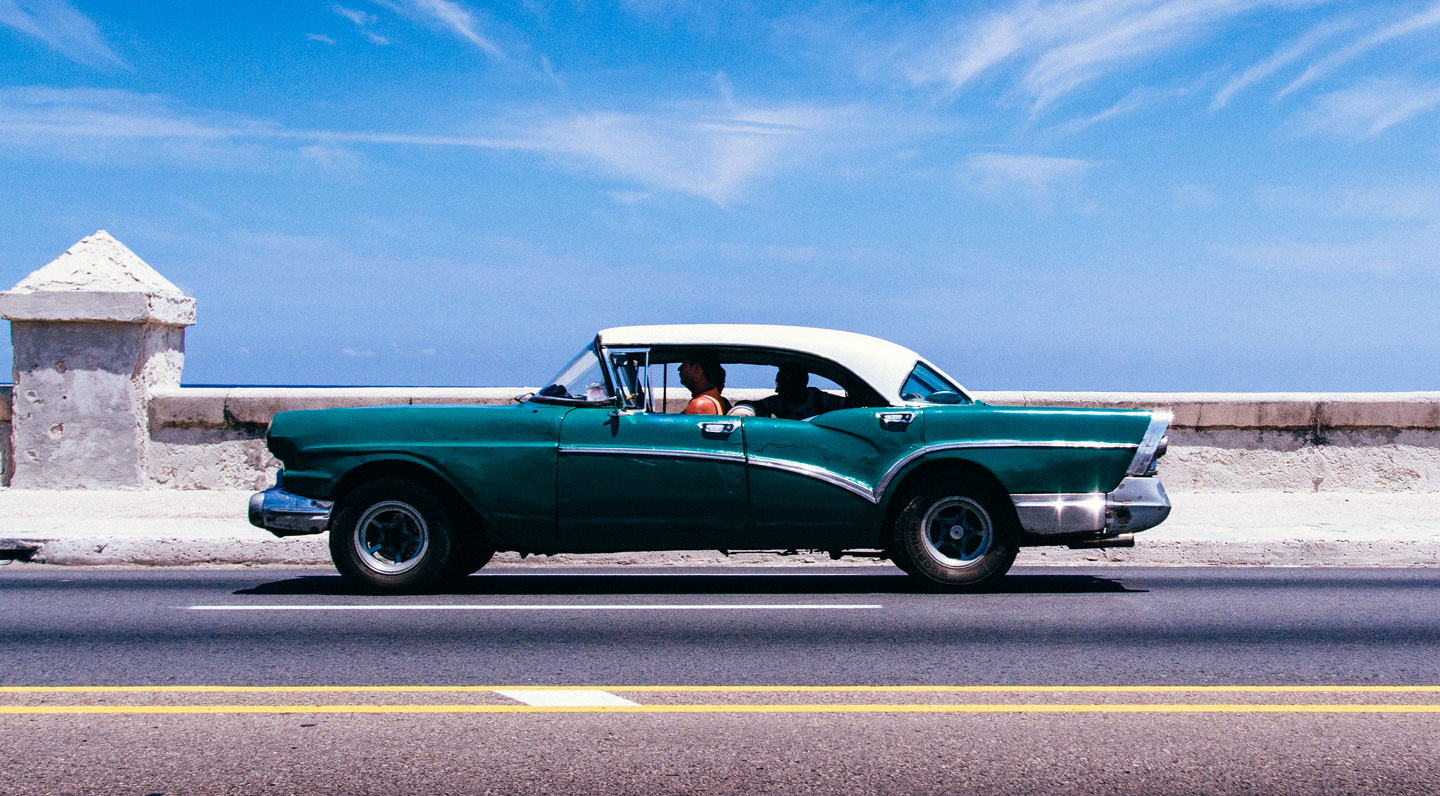 A vintage car on the road of Havana.