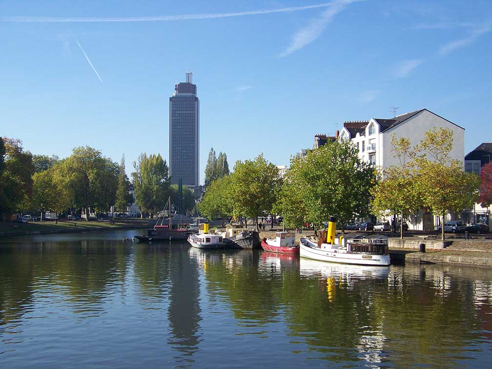 Erdre river and Tour Bretagne (Bretagne tower) in Nantes, France