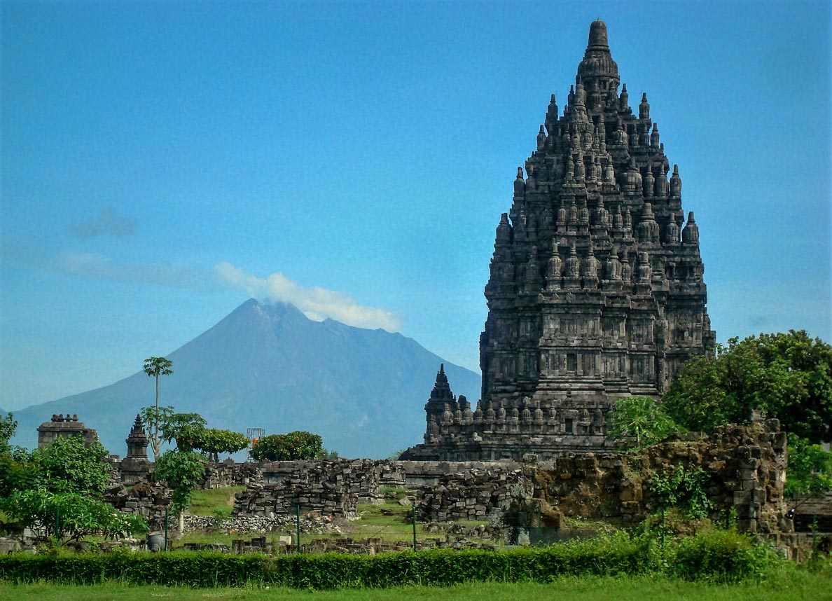 Prambanan temple with the Merapi volcano near Yogyakarta in Central Java