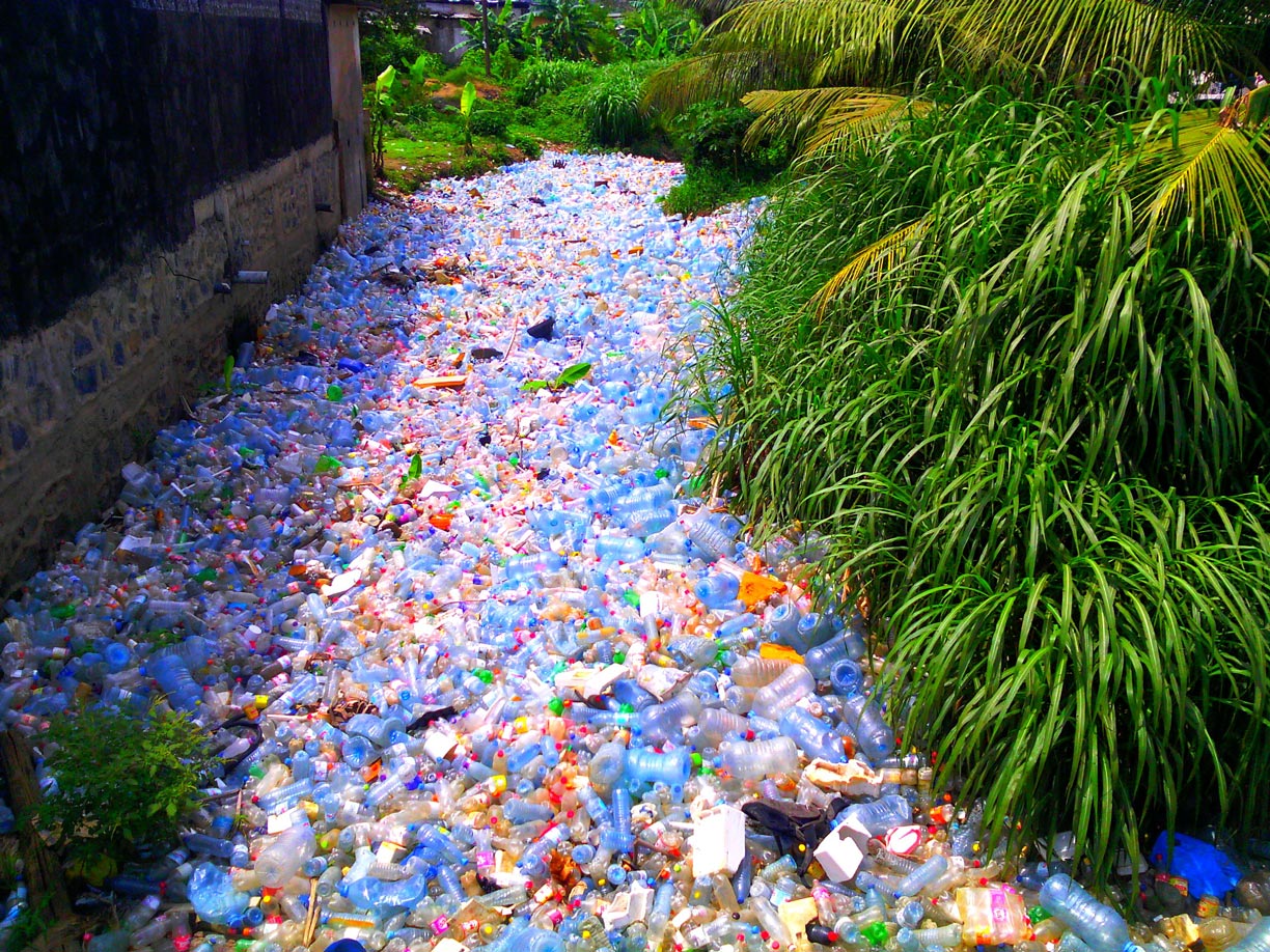 A stream in the Malagasy city of Douala, swallowed by plastic pollution.
