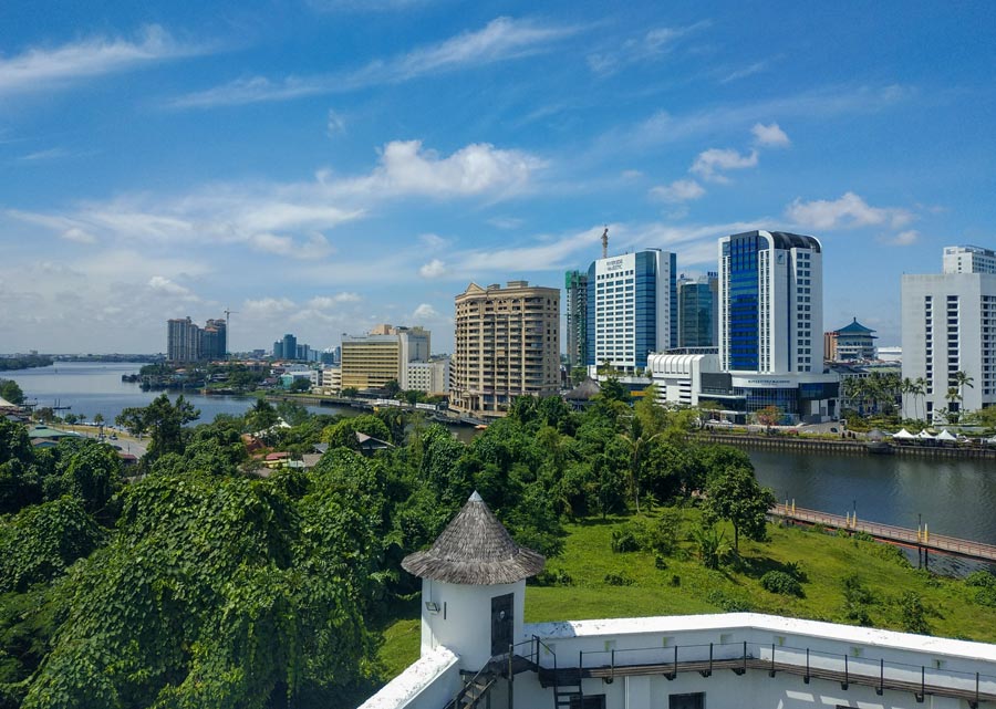 View of the Central Business District of Kuching, Sarawak, from Fort Margherita. In the background Riverside Suites (center) and Riverside Majestic Hotel on the Sarawak River.