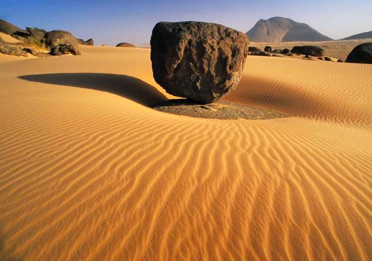 Sand and stones in the Sahara Desert