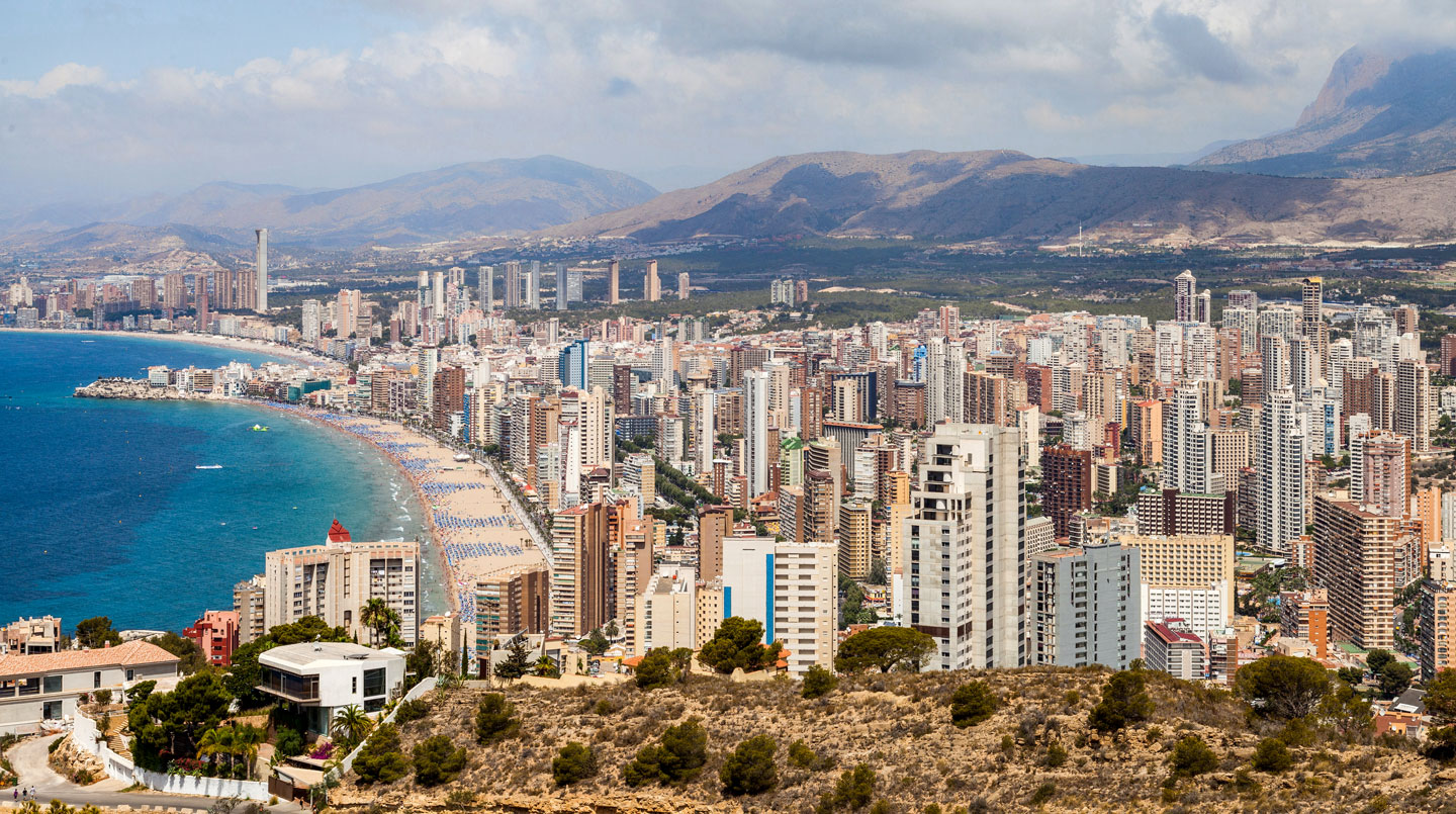 High-rise buildings with hotels for mass tourism in Benidorm, a city on the Costa Blanca of the Mediterranean Sea in Spain.
