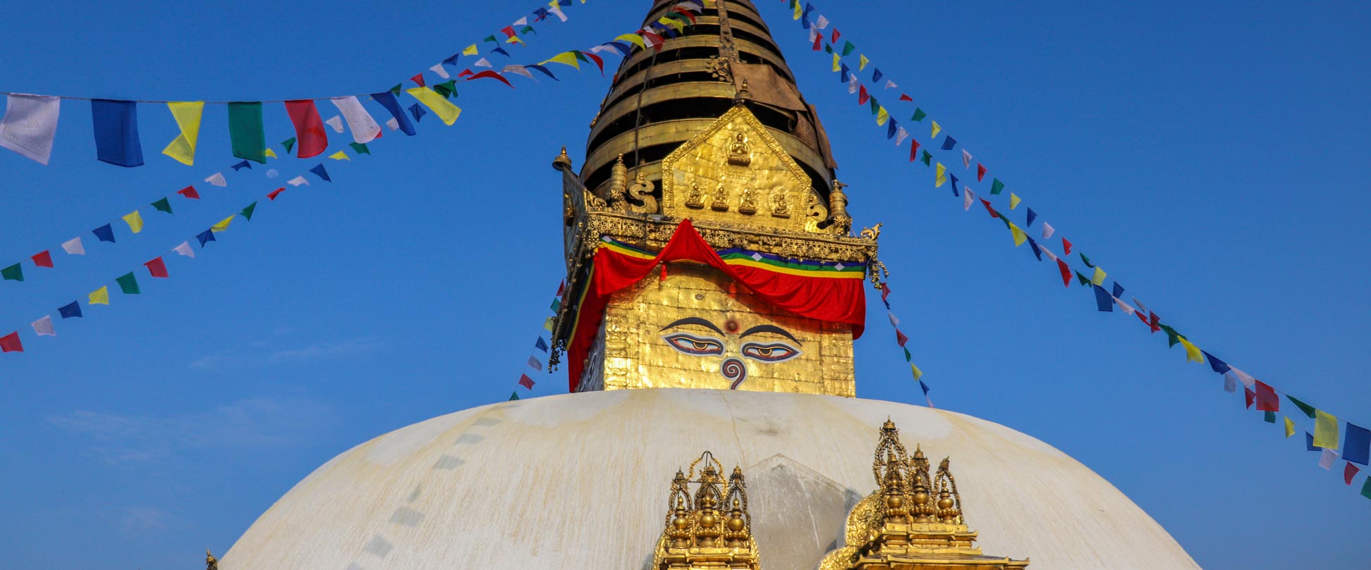 Swayambhunath stupa with "Buddha's eyes" and prayer flags