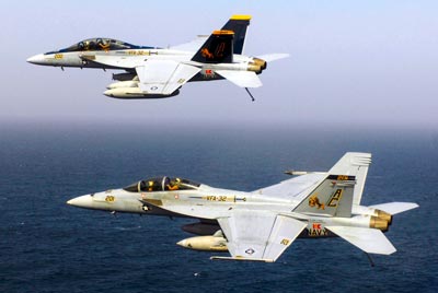 Two U.S. Navy F/A-18F ''Super Hornets'' over the  Persian Gulf.