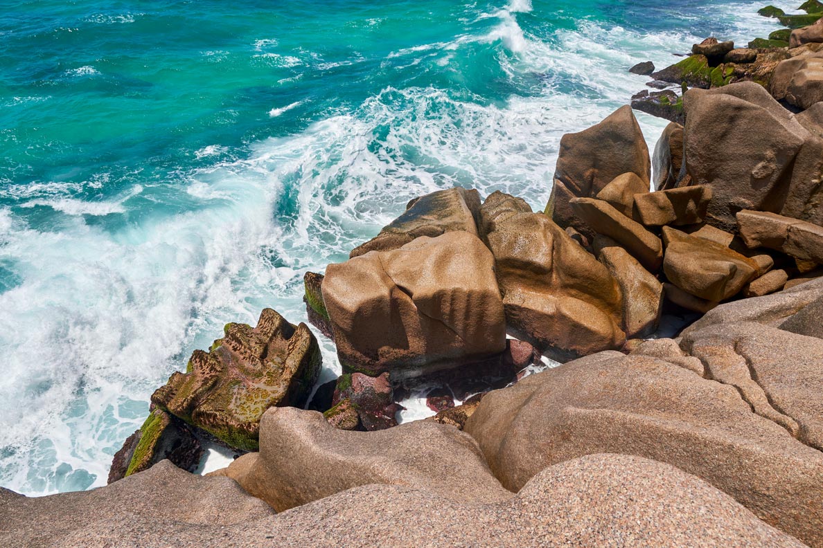 Rocks and waves La Digue, Seychelles Rocky beach on La Digue, Seychelles