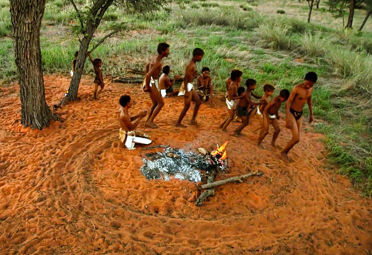 Dancing around fire. South Africa's ǂKhomani People