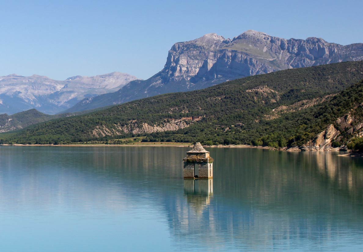 Church tower of the lost village of Mediano in the Embalse de Mediano