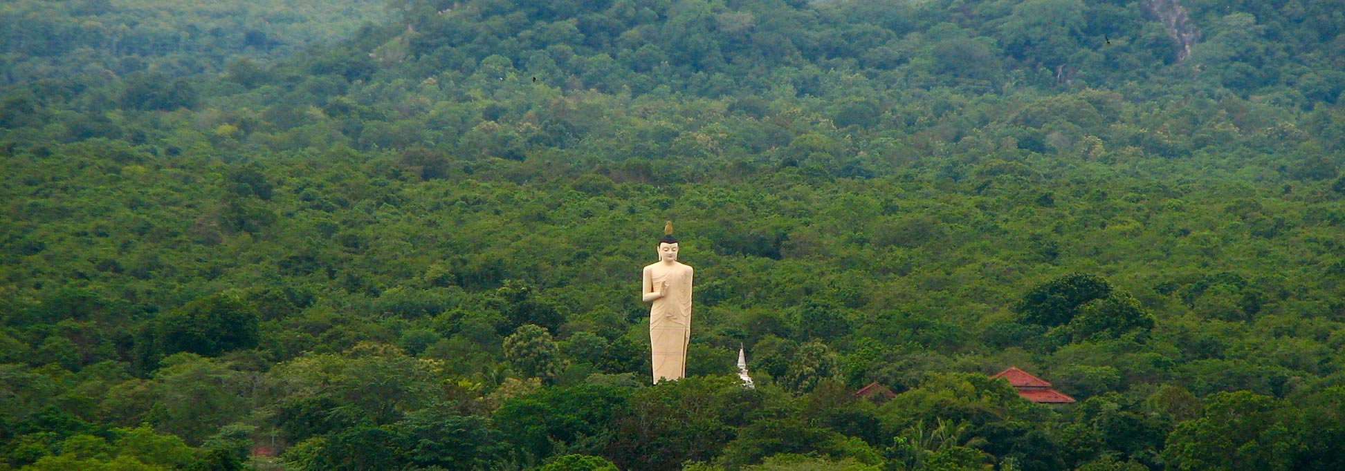 Buddha statue seen from Sigiriya rock fortress, Sri Lanka
