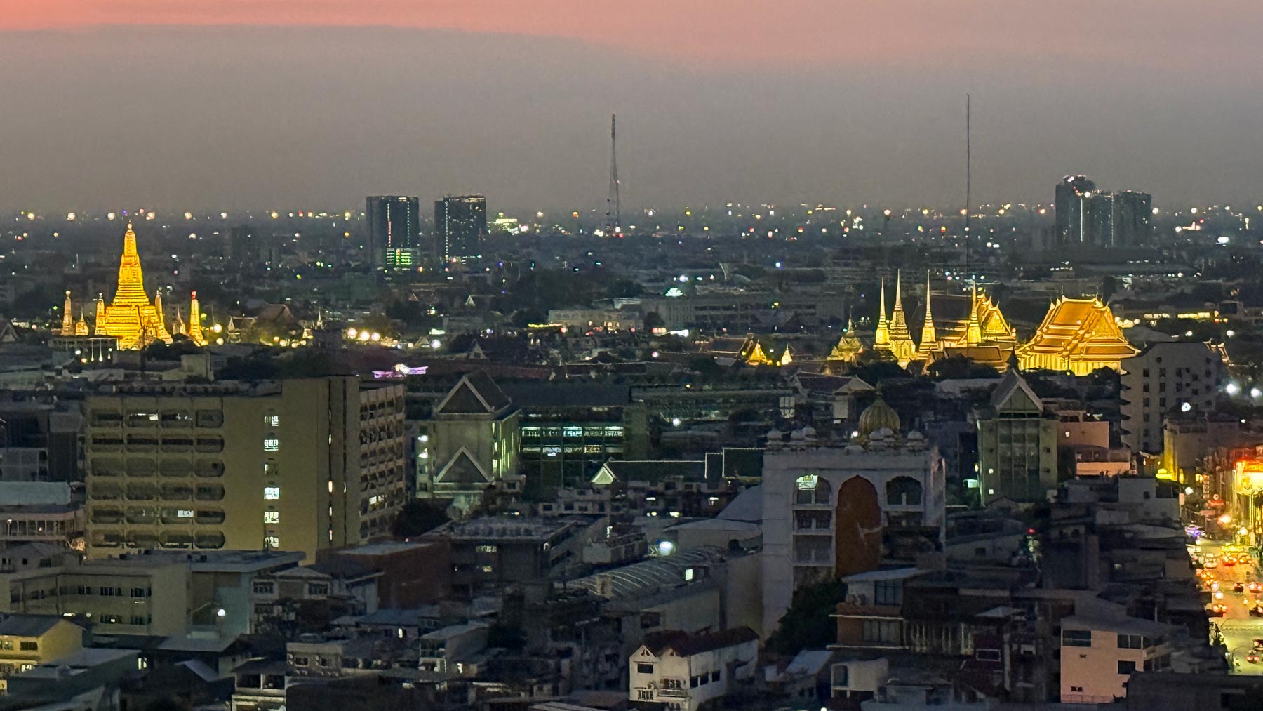Wat Arun (left) and Wat Phra Kaew Palace, Bangkok, Thailand.