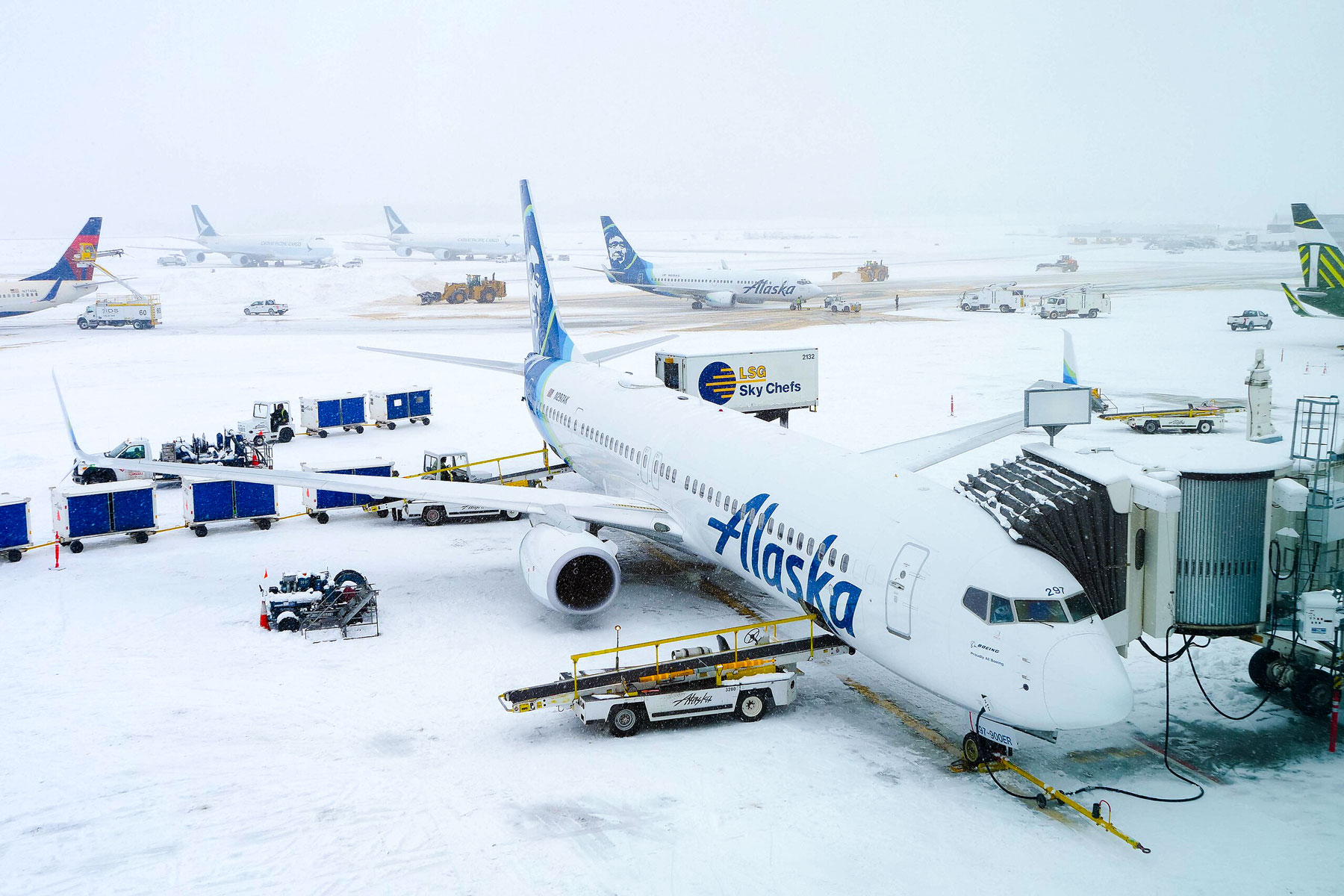An Alaska Airlines Boeing 737-900ER on the tarmac at Ted Stevens Anchorage International Airport.