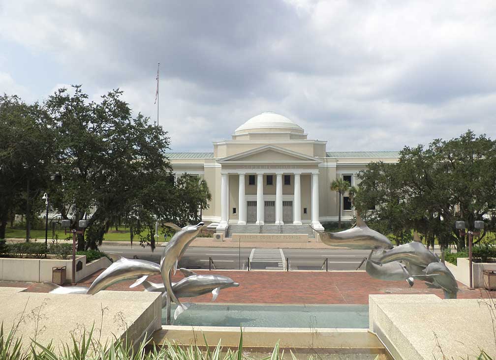 Stormsong, Dolphin sculpture by Hugh Bradford Nicholson, Florida Supreme Court in background, Tallahassee, Florida