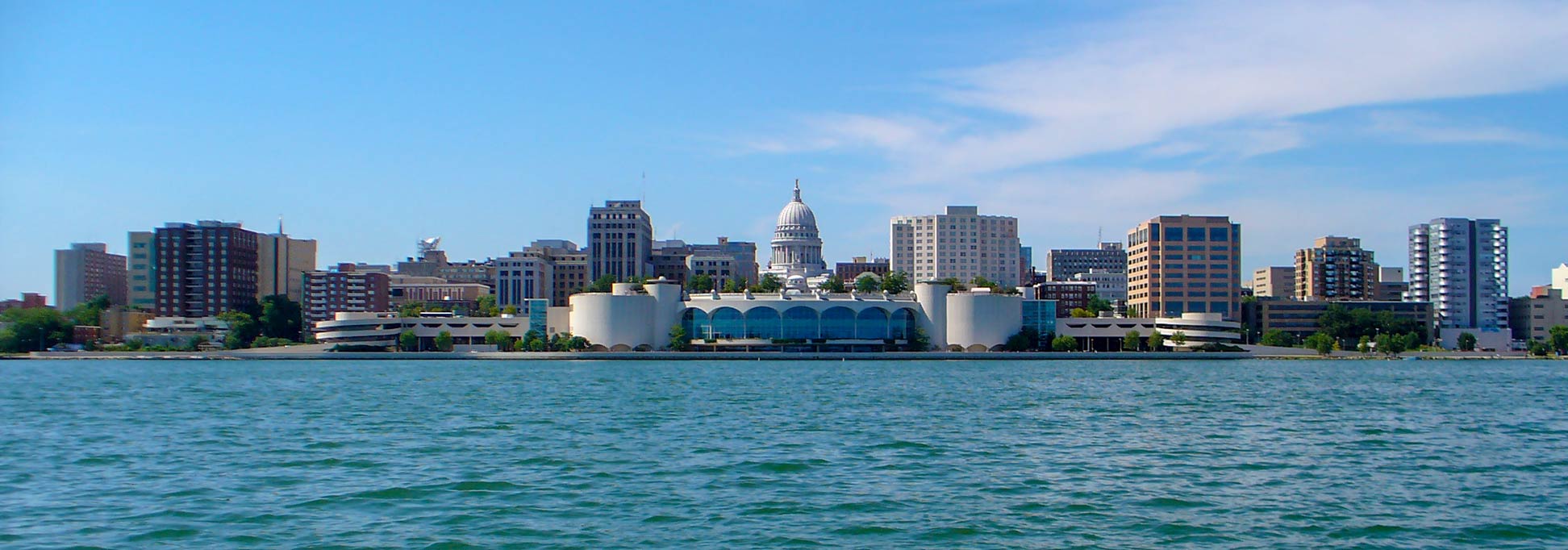 Skyline of Madison, Wisconsin as seen from Lake Monona. Monona Terrace in center