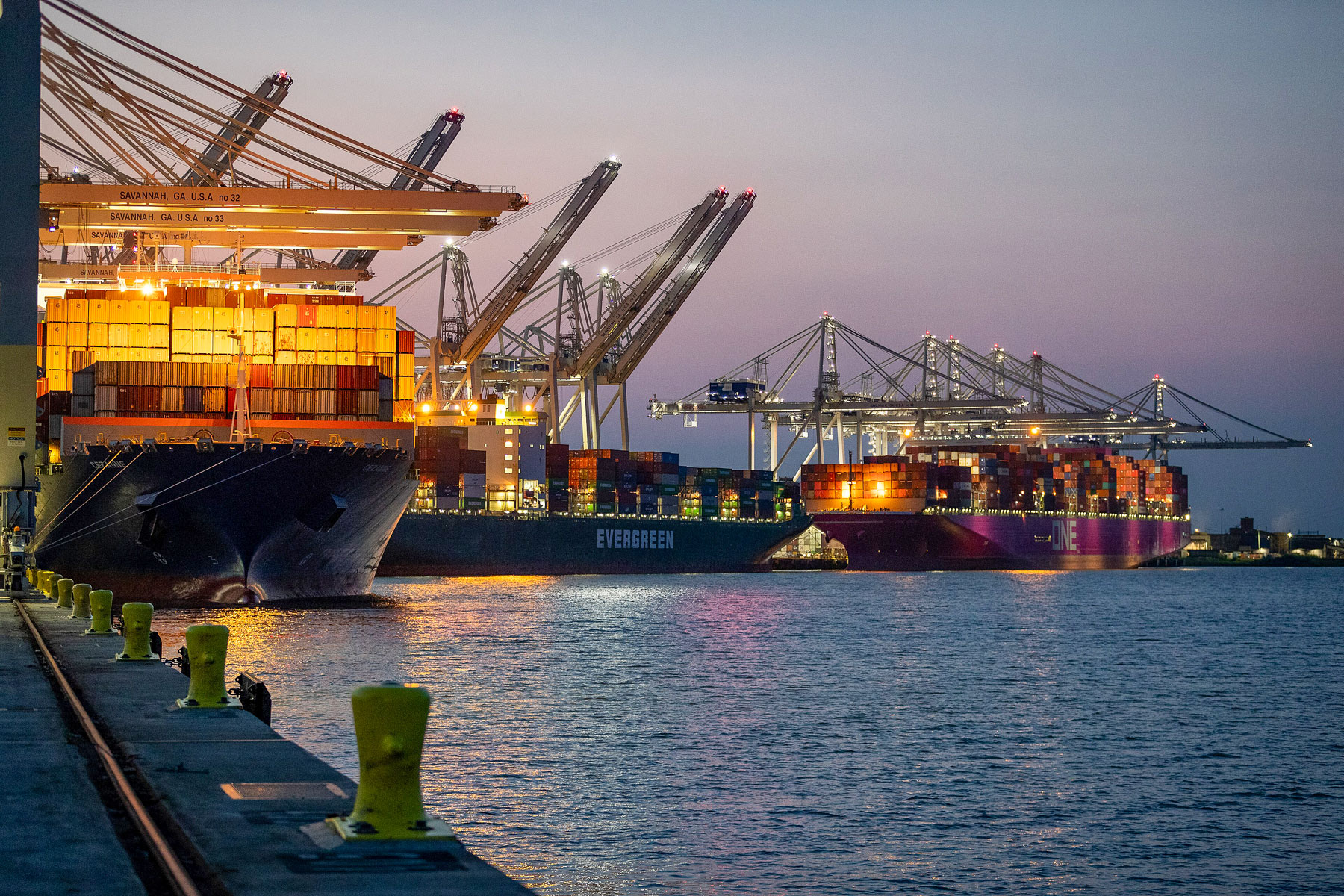 Containers ships docked at the Port of Savannah at dusk
