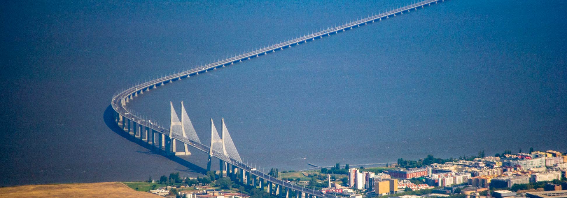 Over the clouds - back to earth. Vasco da Gama Bridge, Lisbon, Portugal