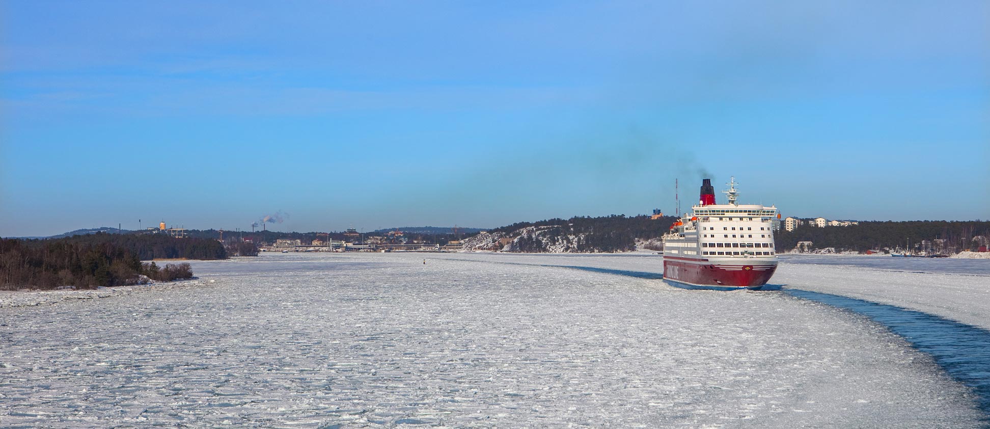 A Viking Line ferry sails through the ice of the Baltic Sea south of the Åland Islands.