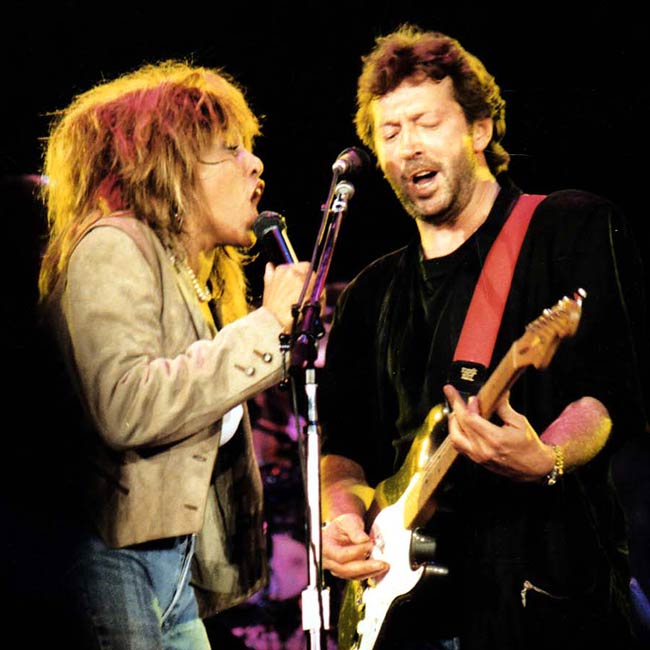 Tina Turner and Eric Clapton, in concert at Wembley Stadium, England, 1987